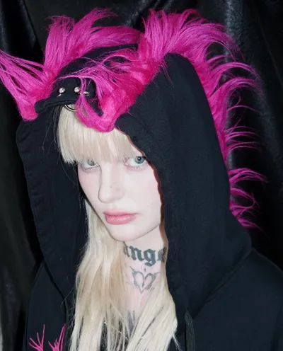 Pinkspink look with a feathered hood